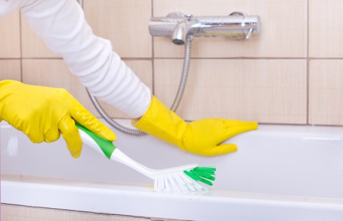 Kitchen surfaces being cleaned during move out cleaning