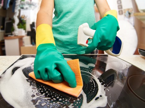 Professional office cleaning supplies and tidy desk area