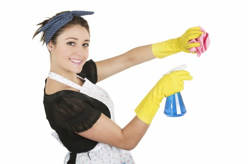 Kitchen surfaces being wiped during domestic cleaning